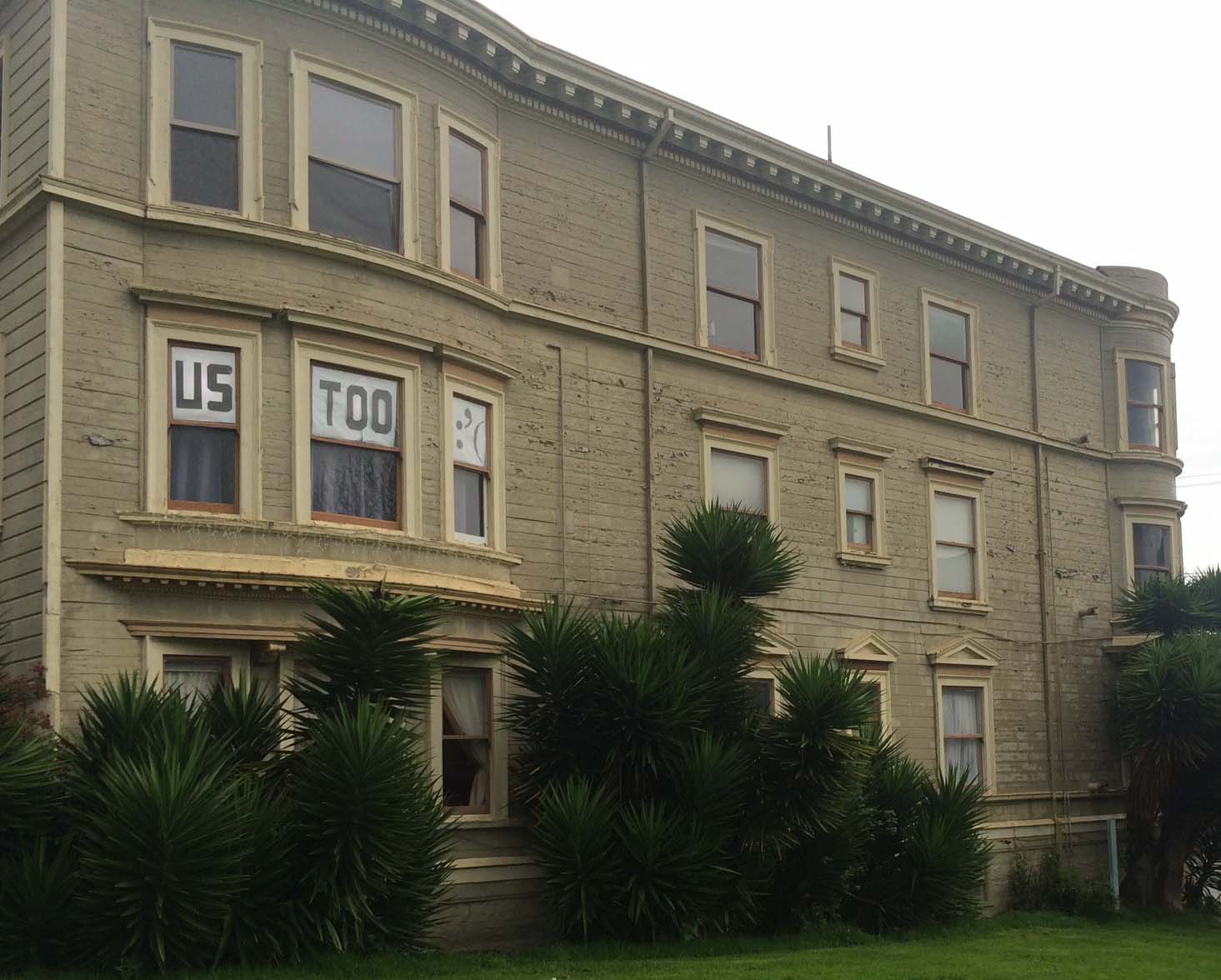 A house in Duboce Triangle hung signs in their windows saying