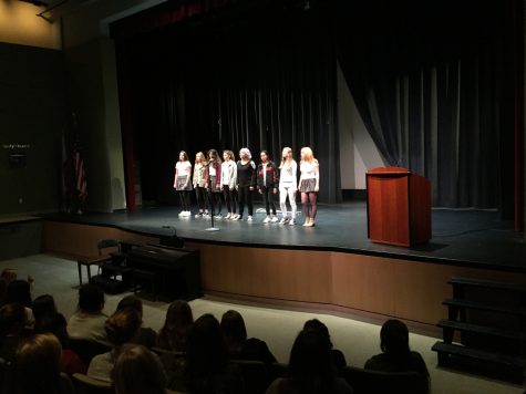 Choir performs a cappella set at assembly