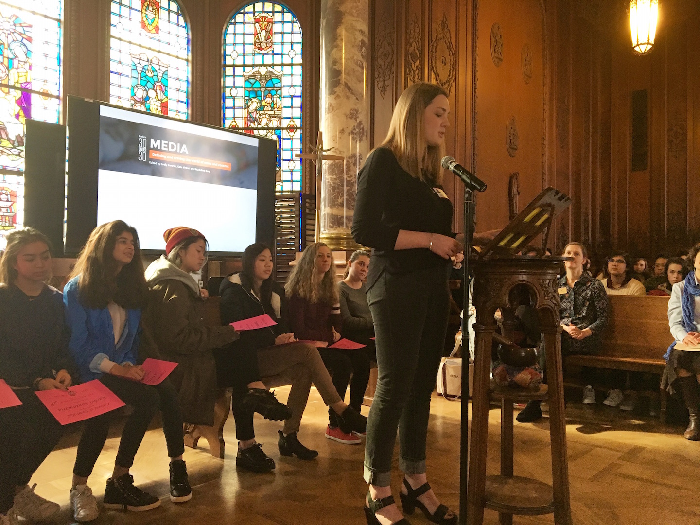 Convent Alumna Libby Brittain ‘07 presents the 2017 all-school Kate Chopin essay contest winner. Sophomore Sydney Caba won with her piece about self-identity in today’s America.