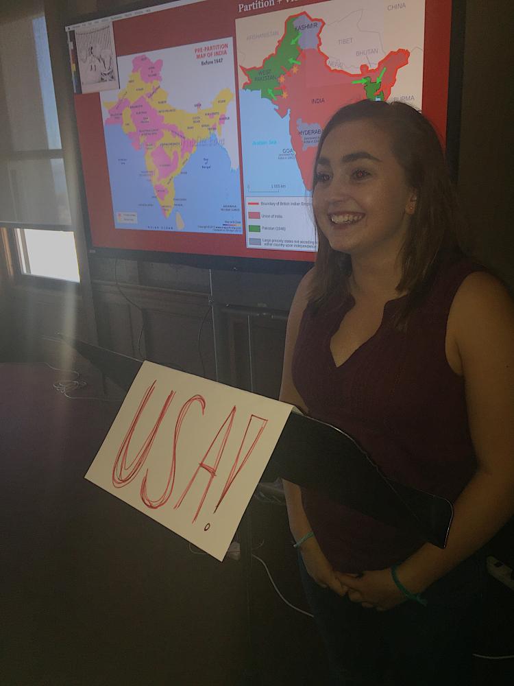 Sophomore Megan Mullins delivers a speech as President John Fitzgerald Kennedy for the United States. Mullins’ speech explained the reasoning behind the actions of the United States during the Cold War.