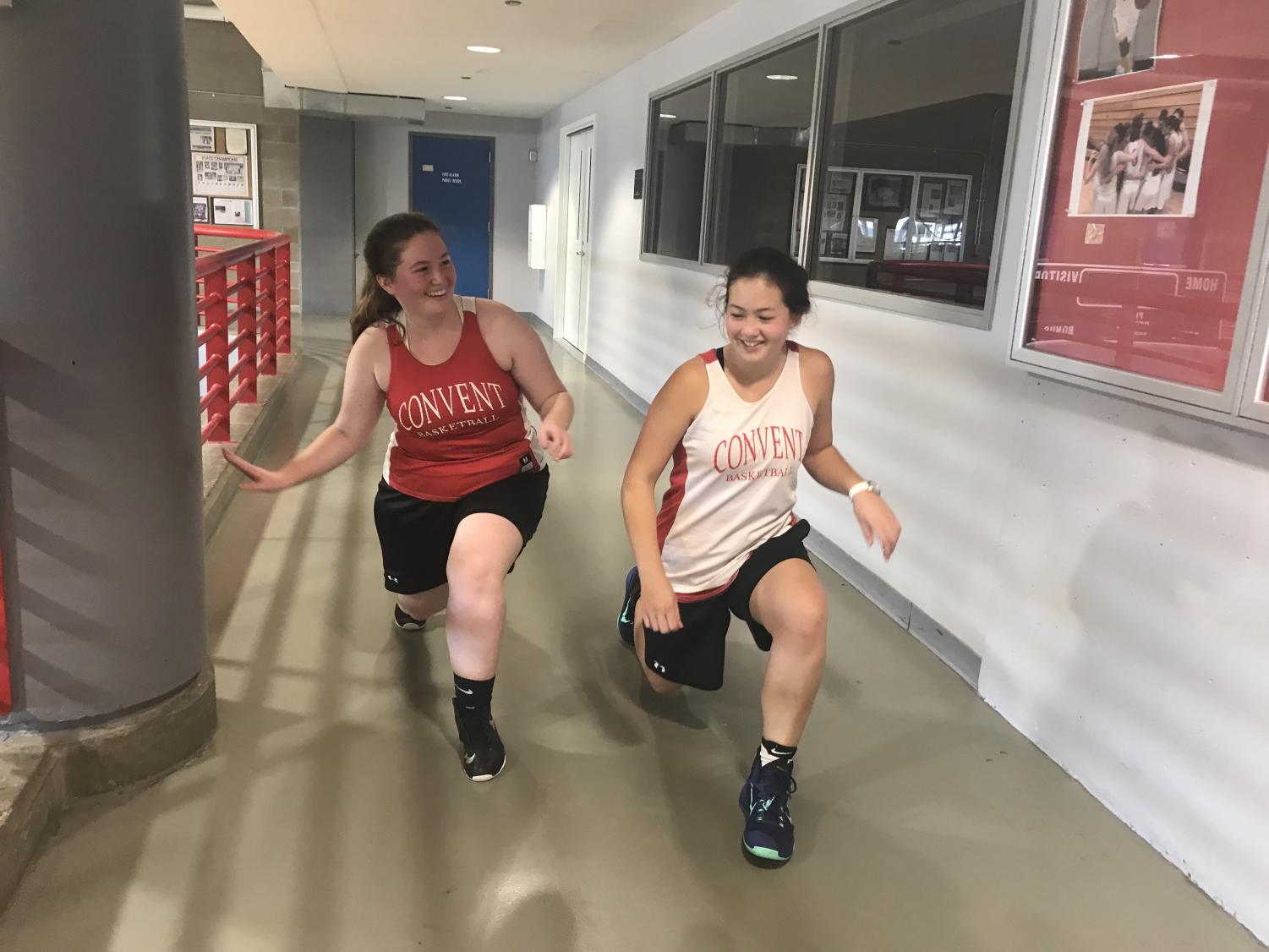 Senior Grace Ainslie and junior Mason Cooney cool down after a basketball open gym. This extra basketball practice was created in preparation for the upcoming basketball season.