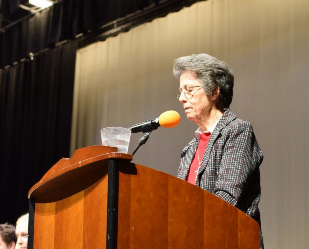 Paula Toner, RSCJ, announces the 2018 Writing Festival All-School Winners. Senior Francesca Petruzzelli won for Convent, and junior Eli Mundy won for Stuart Hall.