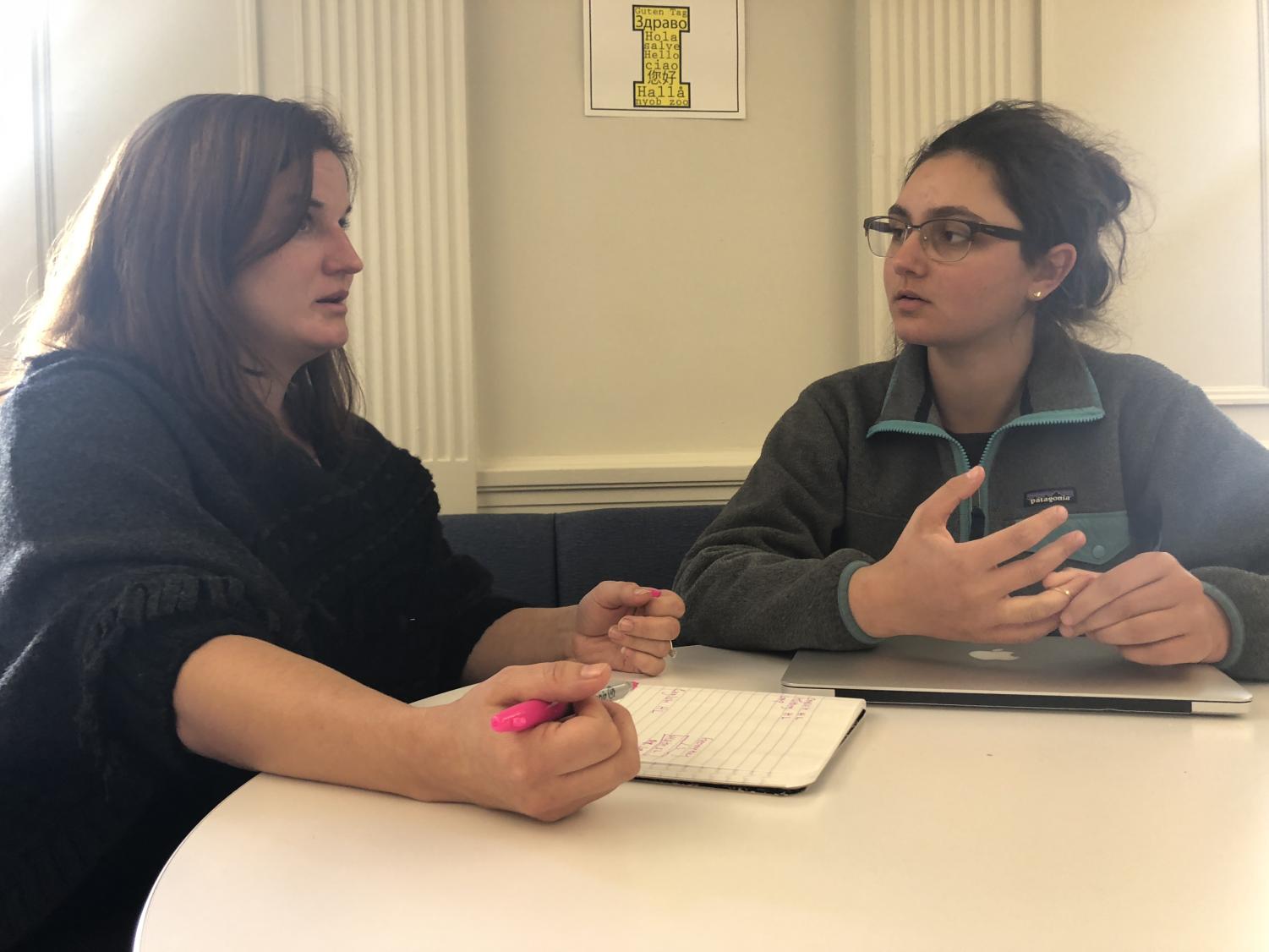 Sophomore Sonia Alazraie meets with Academic Director Betsy Pfeiffer to choose her classes for her junior year. Pfeiffer uses teacher recommendations and the student's interests to help choose the most beneficial classes for each student.