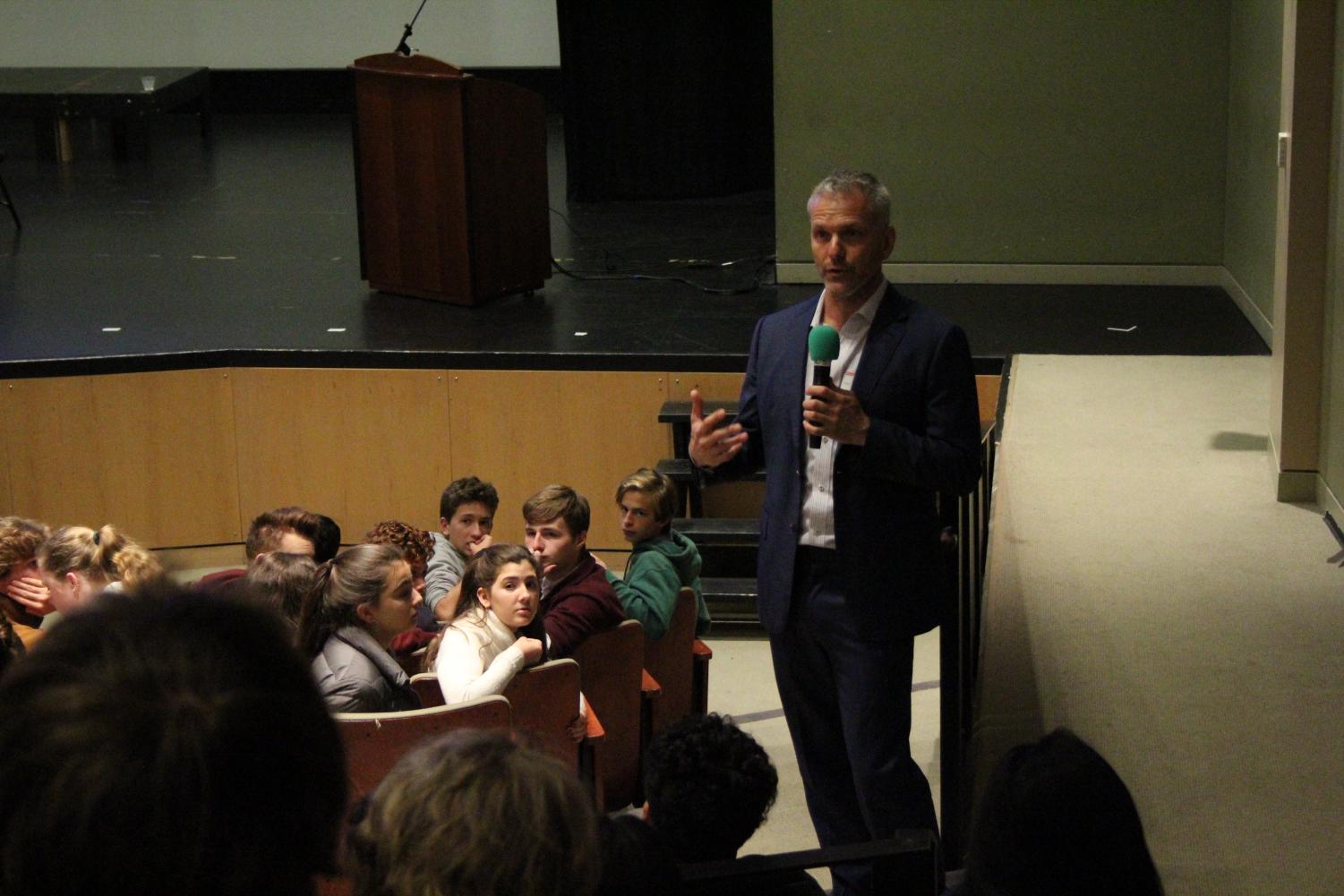 George Gigounas answers questions from students at the end of the presentation. Students can get involved in climate change by looking at the UNFCCC website or joining the Environmental Awareness Club.