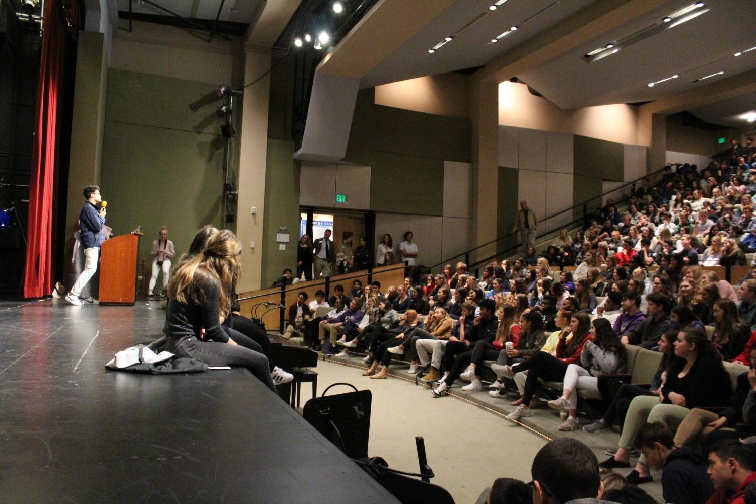 Junior Trevor Blanc performs the last student poem before guest poets came to the stage to perform. Ten students from Convent and Stuart Hall read their poems to the student body.
