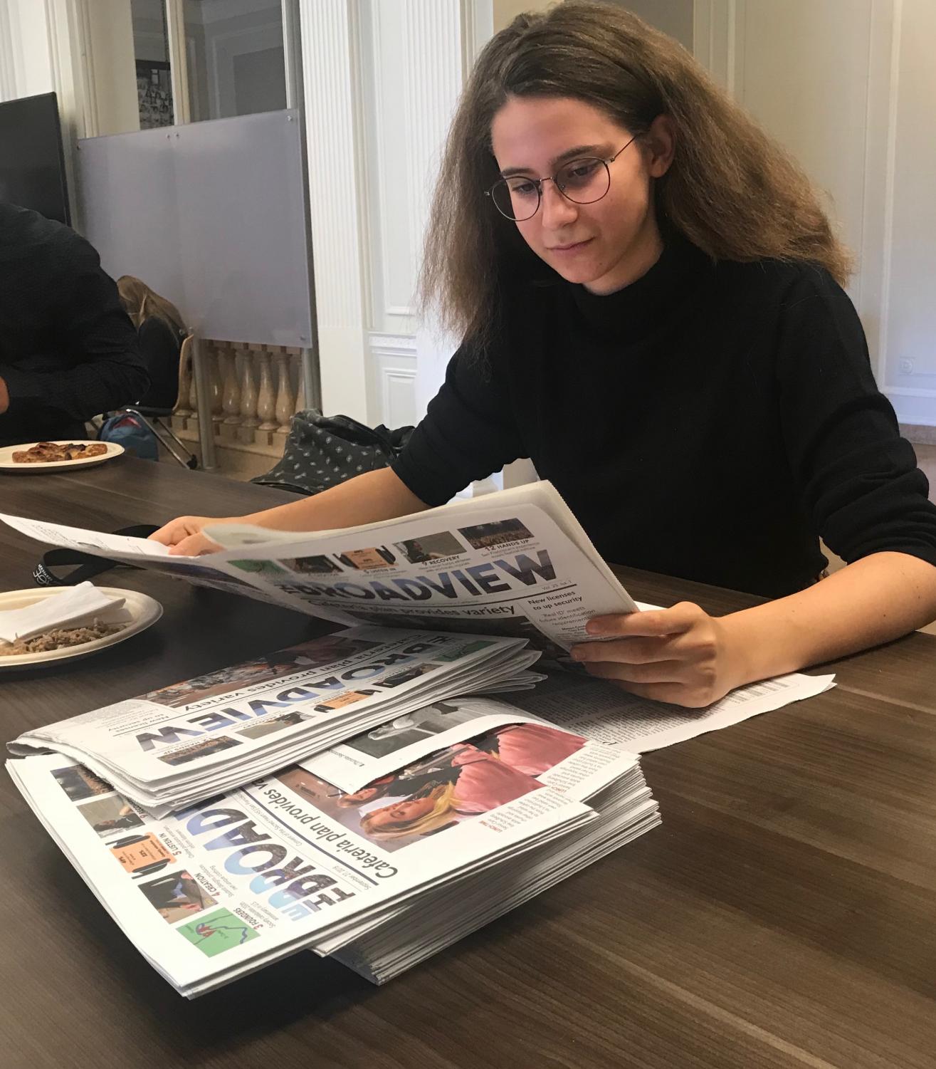 Junior Arlena Jackson reads the latest edition of The Broadview during National Newspaper Week. This week celebrates the service newspapers provide to the nation.