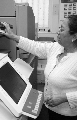 Employee in printing office appreciates work
