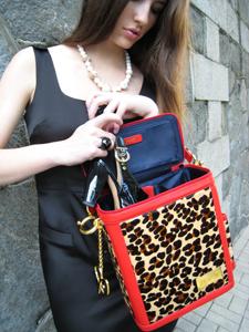 Alumna Pearl Ng makes accessories that are beautiful, and useful. Ng designed a leopard-print shoe bag as a stylish, practical way to carry shoes.    PEARL NG | with permission