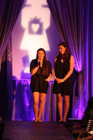 Co-chairs Frankie Incerty (left) and Erin Minuth open the 4th Annual Simple Gifts Fashion Show in the Main Hall of the Flood Mansion on Thursday Night. The organizaiton raises funds for organizations benefitting women and children. Photo: INA HERLIHY | the broadview
