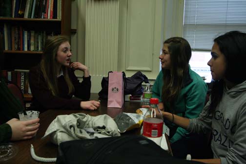 MAGGIE CUMMINGS | the broadview Sophomore Lily Kaplan talks to rising sophomore Francisca Bayer at lunch. Bayer lived and attended classes with freshman Cate Svendson but later during her stay she attended Women’s Studies, French and an Art Class on her own. It is summer for students in Chile, but the visitors from Reñaca are taking a few different classes at Convent that will not count for credit.