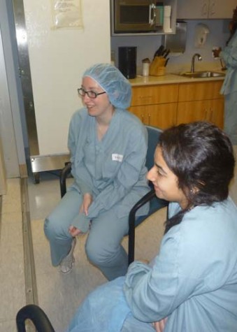 Seniors Kristy Harty-Connell and Kiara Molina sit in the waiting room at Kaiser Permanente Hospital. Physiology students had the opportunity to view open-heart surgery last Wednesday.