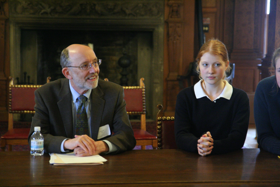 David Bush, a member of the Visiting Team from Western Association of Schools and Colleges/California Association of Independent Schools (WASC) participates in a discussion with students including senior Christina Perkins. The WASC visiting team plans to evaluate student responses to help with their assessment of the Four Schools.