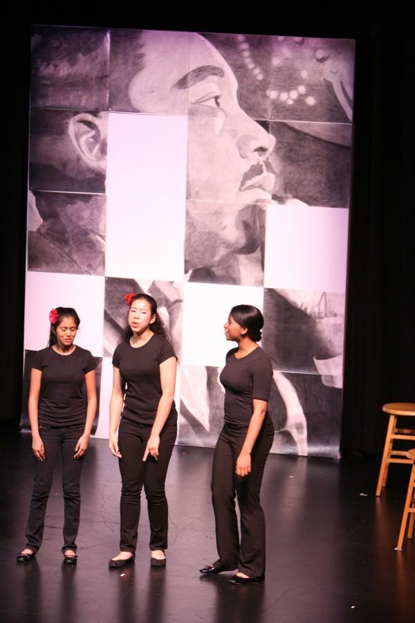 Freshman Ayesha Sayeed and seniors Briana Davis and Ronella Rosenberg perform in “Dedication to a Dream,” a tribute to civil rights. English department chair Karen Randall organized the production.