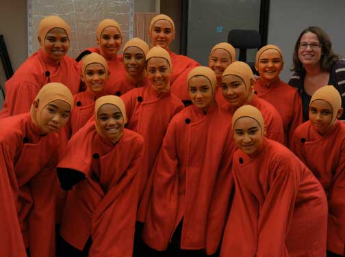 Chiara Figari (back row, far right) gathers backstage of the San Francisco Opera House with other Girls Chorus performing as monks in Puccini's 