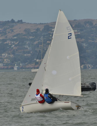 Two Convent sailors race to the finish line during a exculsive competition before the America’s Cup in the Marina. Convent and Stuart Hall sailed in the exhibition on Aug. 21. Jewel Devora | the broadview