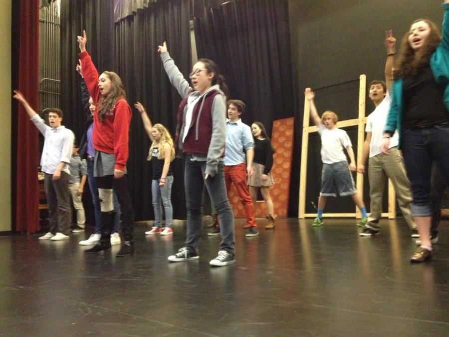 Members of the cast of “In the Heights” practice the choreography to the musical number “Carnival.” The play will premiere on March 13 and runs through the weekend.