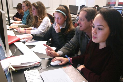 Alice Jones/The Broadview Java Juniors  Amanda Mah, Franny Eklund, Christina Berardi, Aoife Devereux and Zoe Baker (right to left)  work with computer programming teacher Doug Grant during class. The students are currently working on a banking program to track withdrawls balances and reports. ALICE JONES/The Broadview