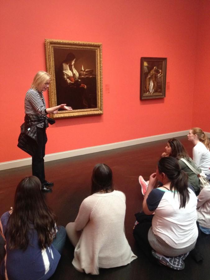 The AP Art History class observes and analyzes the Penitent Magdalen by Georges de la Tour at the Los Angeles Country Museum of Art. The class traveled down to Los Angeles to visit six museums before taking the AP test.