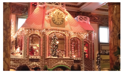 Crowds mill around at the opening of the gingerbread house at the Fairmont Hotel on Nov. 29. The Fairmont Hotel has a donation box to collect money to support LLS.