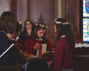 Sophomore Ana Cahuas accepts a prize in science from President Ann Marie Krejcarek as other sophomore recipients of a departmental prize come forward.