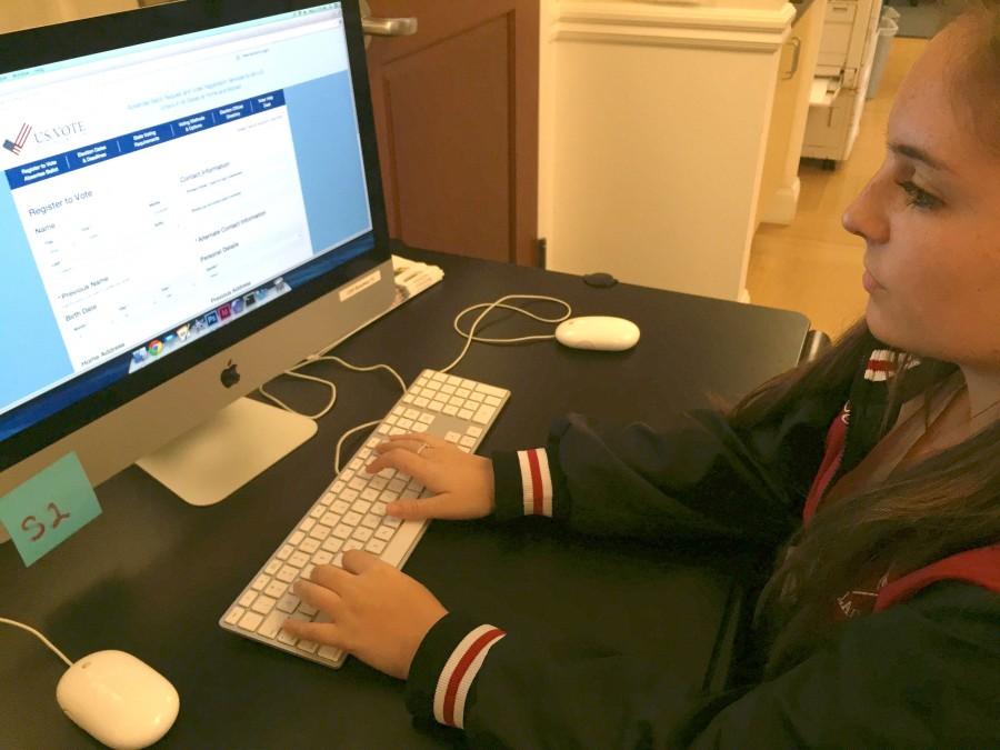 Senior Hailey Cusack registers to vote on the U.S. Vote Foundation website in order to vote in the next election.