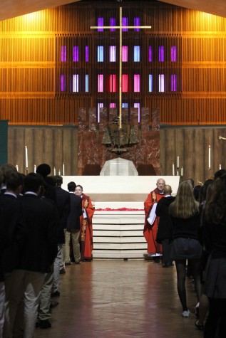 Faculty and high school students line up for communion. Blessings were also offered to students who did not wish to receive communion.