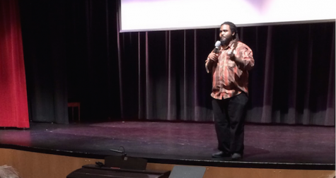 Students listen as Ashanti Branch introduces the film “The Mask You Live In. Branch was featured in the film for his work empowering young men and boys in schools around the Bay Area. 