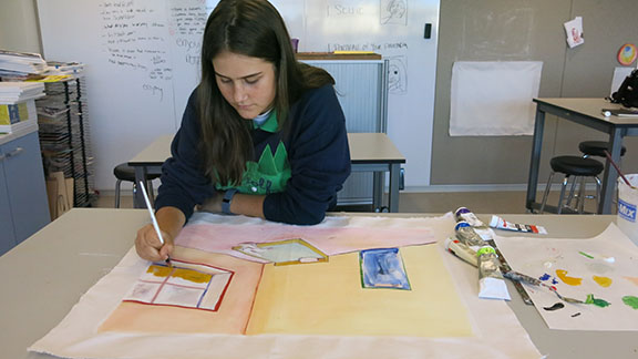 Senior Stella Smith Werner experiments with the ideas of space and depth in a painting prepared for her AP Drawing and Painting class. Smith Werner is one of the few seniors who plans on applying to art colleges, and she is preparing an application portfolio which includes 15 to 20 pieces such as paintings, drawings and photographs. Smith Werner plans to have her portfolio reviewed by a representative of the Pratt Institute on Sunday. 