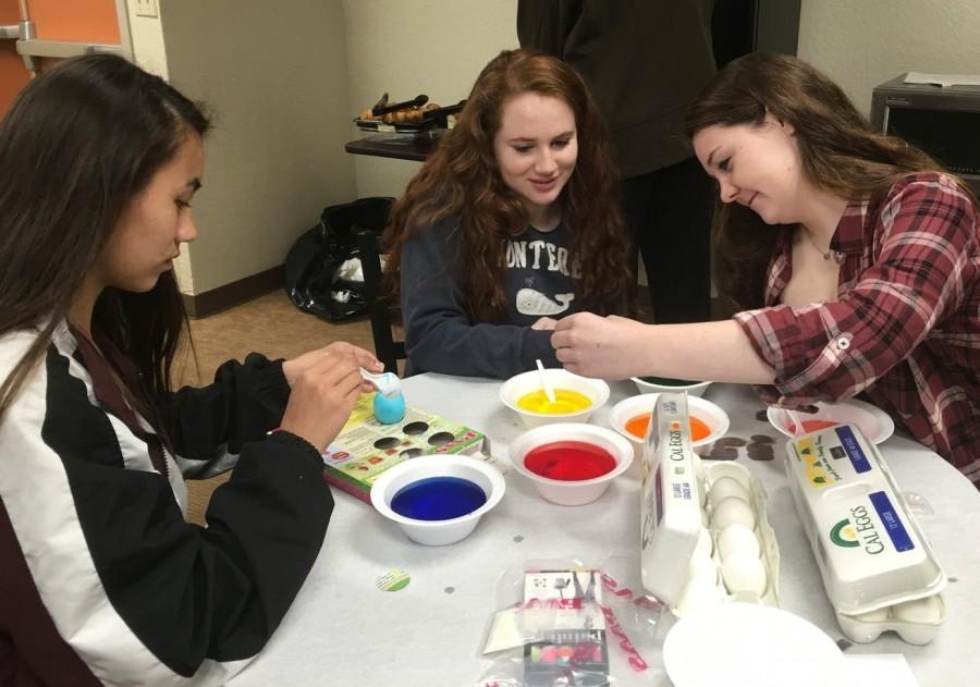Update 3/18/2016: Sophomores Hannah Taschek, Kelly Rosanelli and Mary Crawford dye Easter eggs at El Bethel Senior Center. For their retreats, sophomores went out into the community, giving back to several organizations, including El Bethel.