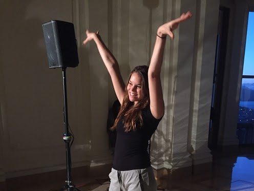 Senior Chloe Lovato strikes a pose during the rehearsal for the annual Simple Gifts Fashion Show. The event will be donating their funds to La Casa de las Madres, a shelter for domestic violence victims. 