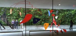 Double Gong, a 1953 mobile by Alexander Calder hangs in the Alexander Calder: Motion Lab exhbition at the San Francisco Museum of Modern Art. Calder is most famous for his hanging sculptures, which consist of abstract shapes connected by wires.