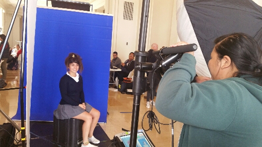 Senior Julia Gutman poses for her silly school photo. Some seniors took casual photos, with everything from crazy hairstyles to borrowed glasses being documented on their student ID cards.