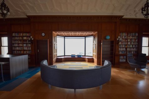 A modernized couch overlooks the foggy bay in the Mother Williams Library. The new  furniture began to be moved in on Thursday.