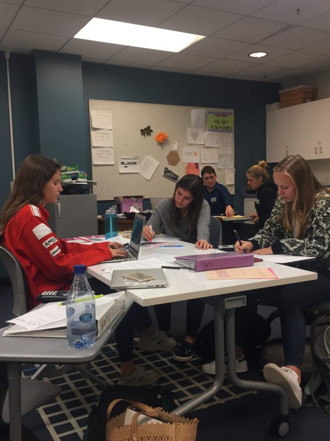 Juniors Mary Gray Simon, Rosie Morford, and Caroline OConnell study in Mr. Person-Rennells room during a free period. Students took advantage of the quiet space to get some work done.