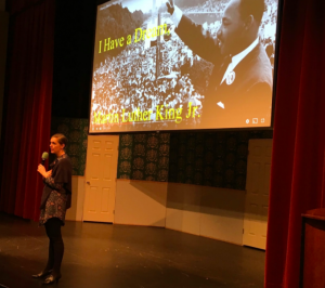Head of School Rachel Simpson introduces a video of Martin Luther King Jr.’s “I Have a Dream” speech at assembly. As part of today’s assembly, students were asked to listen and reflect on the words in the speech.