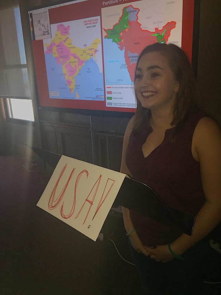 Sophomore+Megan+Mullins+delivers+a+speech+as+President+John+Fitzgerald+Kennedy+for+the+United+States.+Mullins%E2%80%99+speech+explained+the+reasoning+behind+the+actions+of+the+United+States+during+the+Cold+War.
