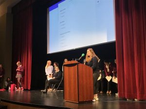 Junior Grace Ainslie gives her candidacy speech for spirit officer. Candidates listed reasons they felt they are qualified for student council as well as their plans for next year. 