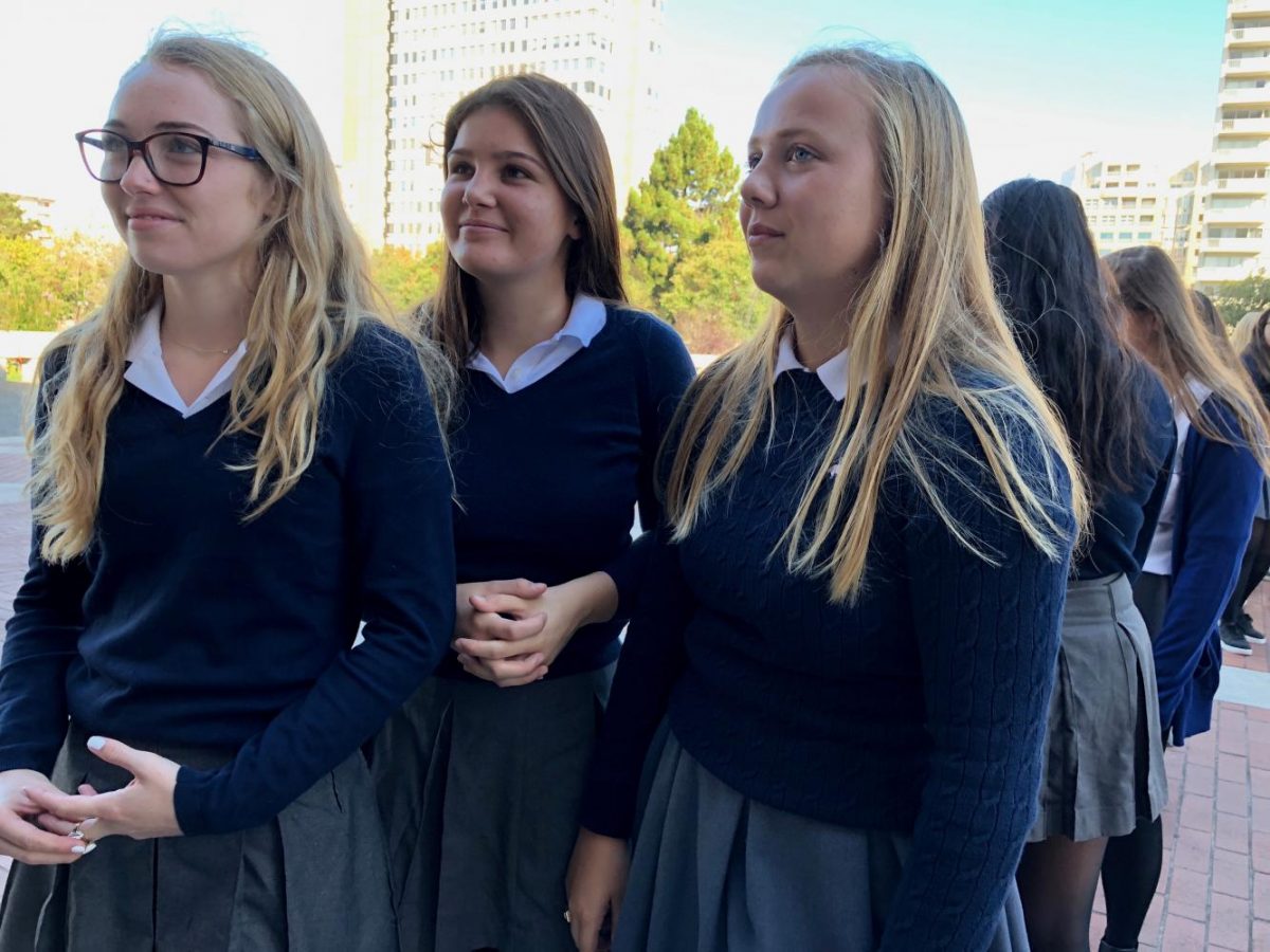 Seniors+Annie+Macken%2C+Rosie+Morford+and+Caroline+OConnell+wait+outside+Saint+Mary+of+the+Assumption+before+the+senior+procession+into+the+cathedral.+The+senior+procession+starts+the+Mass+of+the+Holy+Spirit+along+with+the+opening+prayer.
