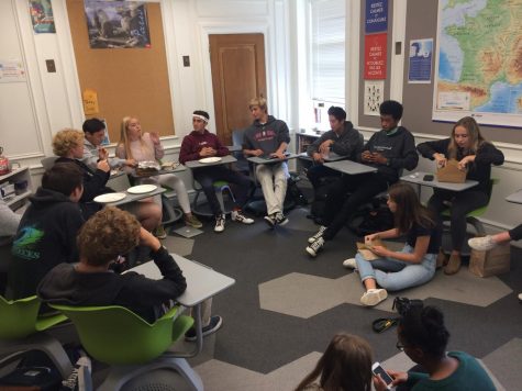 Club head Jemima Scott (left center) addresses the Surf Club during their lunch meeting. This was the clubs first meeting of the year.