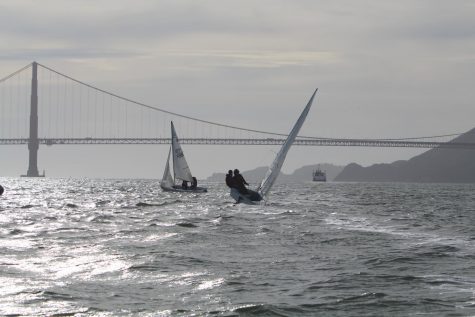 Convent & Stuart Hall boat sails in front of the Golden Gate Bridge during practice last season. The team practices at the St. Francis Yacht Club on the bay.