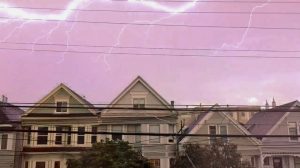 Lightning bolts flash across the San Francisco sky Monday evening in the Richmond district. Thunderstorms hit the Bay Area after high winds and abnormally warm weather.
