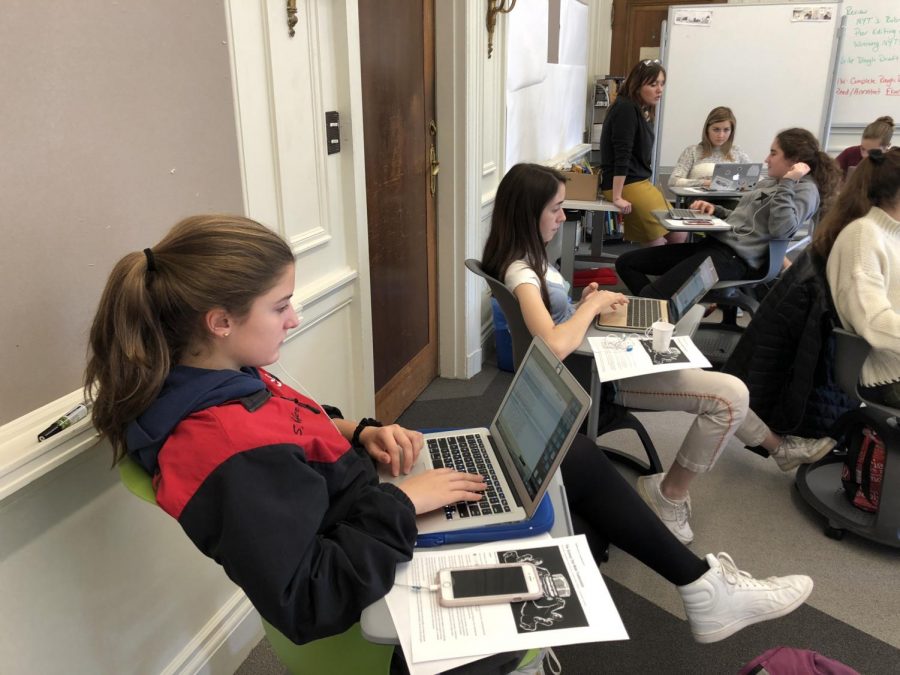Sophomore Sofia Telfer works on her editorial during her D Period English  class. Students were given three classes to write and edit their editorials. 