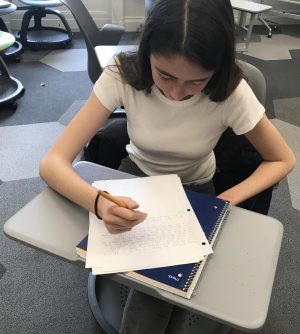 Sophomore Isabella Parmenter hand writes a narrative during the formerly known Kate Chopin Writing Contest. Students were given their entire English periods to respond to the prompt “when everything changed”. 