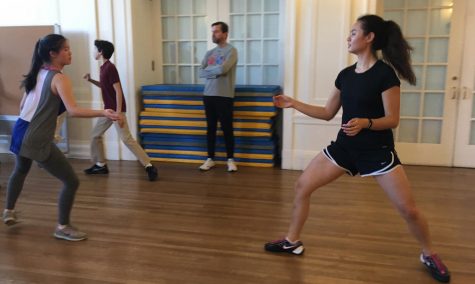 The fencing team practices its footwork during an afternoon practice outside the Little Theater on the Broadway Campus. 