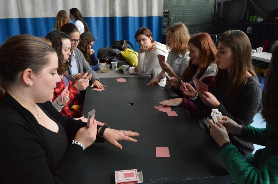 Convent students play a game of tongues before lunch. Free pizza was available to students in addition to water and vending machines. 