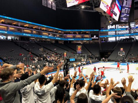 Crowd members raise their hands to try and distract the opposing team while they shoot free throws. While Stuart Hall players took free throw shots, the crowd held out their hands and wiggled their fingers sending “good vibes” to the team. 