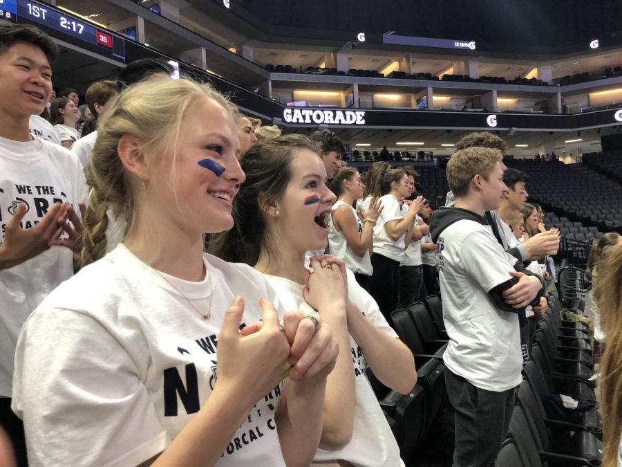 Juniors Abby Anderson and Olivia Mohun cheer on the Knights in the State Championship. The whole school drove up to Sacramento to support the team. 