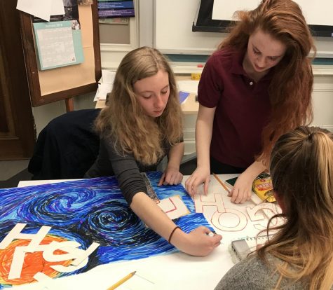 Senior Sydney ONeil colors a poster in her AP Art History class that will be used to support the Stuart Hall Knights in their basketball championship game. The poster will read Van Gough.