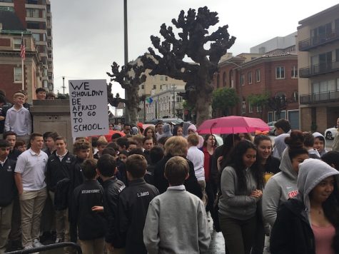 High school and middle form students participated in the National School Walkout this morning at 10 a.m. Despite the heavy rain and hail, hundreds of students marched around the block and down Fillmore Street in support of stricter gun control.