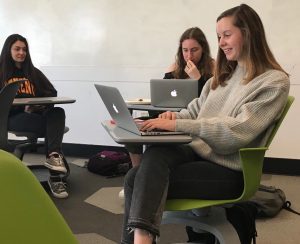 Environmental awareness club co-head Emma Hubbard and junior Poppy Cohen brainstorm ways of raising community awareness about climate change. Hubbard and junior Leet Miller began the club this year, which meets every other Wednesday.